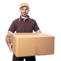 Smiling worker with parcel in hands