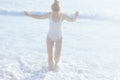 Smiling 40 years old woman in swimwear at beach having fun time Royalty Free Stock Photo