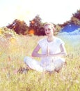Smiling yoga girl meditating for joyful retreat, colorful retro filter