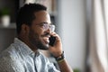 Smiling african business man making business call talking on phone Royalty Free Stock Photo