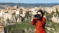 Woman tourist with photo camera, Cuenca, Spain Royalty Free Stock Photo