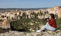 Woman tourist with photo camera, Cuenca, Spain Royalty Free Stock Photo