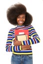 Smiling young african american female student holding school books Royalty Free Stock Photo