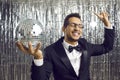 Overjoyed black man with disco ball partying Royalty Free Stock Photo