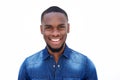 Smiling young african american man in a denim shirt