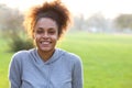 Smiling young african american woman outdoors Royalty Free Stock Photo