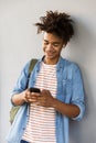 Smiling young african man with backpack outdoors Royalty Free Stock Photo