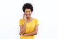 Smiling young african woman talking on cell phone Royalty Free Stock Photo