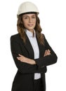 Smiling young architect business woman portrait, with white helmet, arms crossed Royalty Free Stock Photo