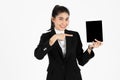 Smiling young Asian business woman holding digital tablet for her work over white isolated background Royalty Free Stock Photo