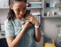 Asian lady veterinarian embraces adorable kitten in modern clinic office Royalty Free Stock Photo