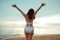 Smiling Young asian woman bikini sexy portrait at seaside beach tropical resting and relaxation travel lifestyle, Happy female fre Royalty Free Stock Photo