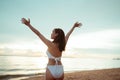 Smiling Young asian woman bikini sexy portrait at seaside beach tropical resting and relaxation travel lifestyle, Happy female fre Royalty Free Stock Photo