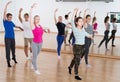 Smiling young ballet dancers exercising Royalty Free Stock Photo