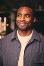 Smiling Young Black Male Standing In Office Looking At Camera Royalty Free Stock Photo