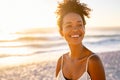 African young woman relaxing at beach during sunset Royalty Free Stock Photo