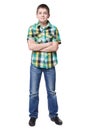 Smiling young boy in shirt and jeans full lenght