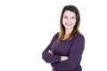 Smiling young brunette woman with crossed arms looking at the camera with white blank copy space Royalty Free Stock Photo