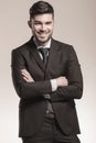 Smiling young business man with hands crossed Royalty Free Stock Photo