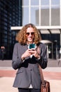 smiling young business man using mobile phone Royalty Free Stock Photo