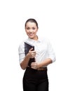 Smiling young business woman holding blue diary Royalty Free Stock Photo