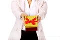 Smiling young business woman holding present box Royalty Free Stock Photo