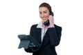 Smiling young business woman on phone Royalty Free Stock Photo