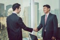 Businessman shaking hand with his partner Royalty Free Stock Photo