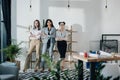 Smiling young businesswomen standing together and looking at camera Royalty Free Stock Photo