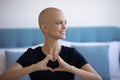 Happy cancer sick woman show heart gesture Royalty Free Stock Photo