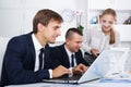 Coworkers working on document paper Royalty Free Stock Photo