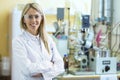 Smiling young chemist in chemistry lab Royalty Free Stock Photo