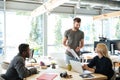 Smiling young colleagues sitting in office coworking Royalty Free Stock Photo