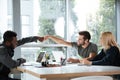 Smiling young colleagues sitting in office coworking Royalty Free Stock Photo