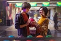 Smiling young couple in a bowling alley Royalty Free Stock Photo