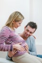 Smiling young couple expecting baby Royalty Free Stock Photo