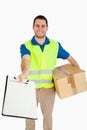 Smiling young delivery man Royalty Free Stock Photo