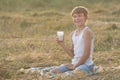 Smiling young farmer during break in field Royalty Free Stock Photo