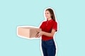 Smiling young female courier is giving a parcel box to a client Magazine collage style with trendy color background Royalty Free Stock Photo