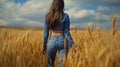 smiling young female farmer cowgirl standing in wheat cereal field. copy space