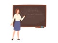 Smiling young female school or college teacher, professor, education worker standing beside chalkboard, holding pointer