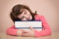 Smiling young girl and books Royalty Free Stock Photo