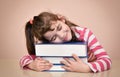 Smiling young girl and books Royalty Free Stock Photo