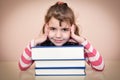 Smiling young girl and books Royalty Free Stock Photo