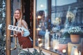 Smiling girl in the flower shop Royalty Free Stock Photo