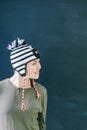 Smiling young girl in funny hat