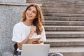 Smiling young girl holding notebook Royalty Free Stock Photo