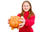 Smiling young girl holding piggy bank Royalty Free Stock Photo