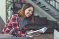 Smiling young girl in the library Royalty Free Stock Photo