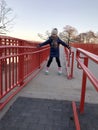 Smiling young girl on rollerskates